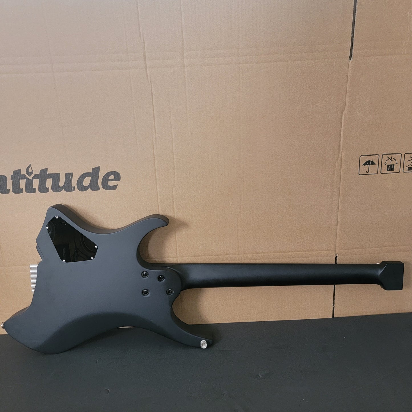 Latitude New Cardinal Headless Electric Guitar Alder body Asymmetrical maple neck, Ebony fingerboard 16 radius Stainless steel bridge weight 5-6 lbs black