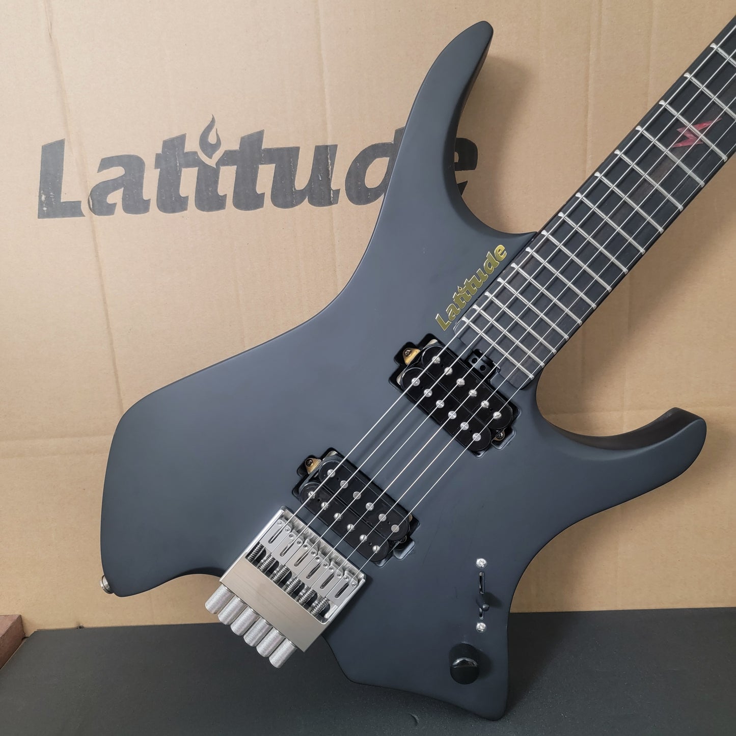 Latitude New Cardinal Headless Electric Guitar Alder body Asymmetrical maple neck, Ebony fingerboard 16 radius Stainless steel bridge weight 5-6 lbs black