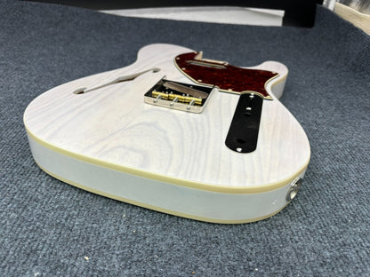 The semi-hollow body of TL electric guitar is 55.9mm wide and 17mm deep, with standard brass bridge and customized circuit.