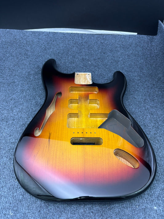 The semi-hollow body of the adapted ST electric guitar is 55.9mm wide and 17mm deep, with standard brass vibrato bridge and customized circuit.