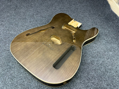 The semi-hollow body of TL electric guitar is 55.9mm wide and 17mm deep, with standard brass bridge and customized circuit.
